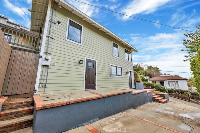 rear view of house featuring a patio area