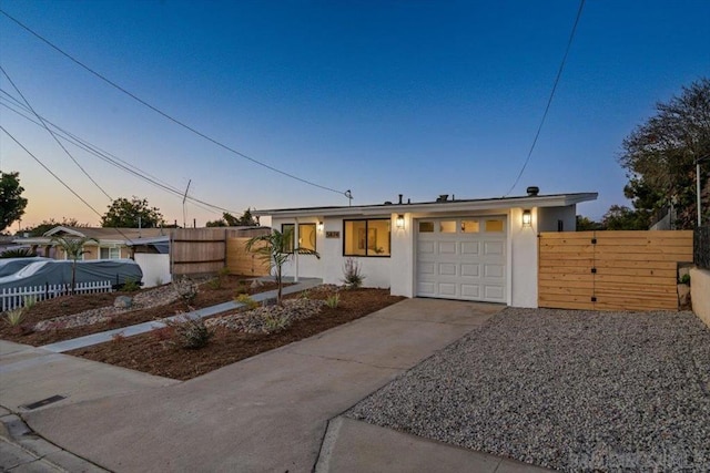 view of front of home with a garage