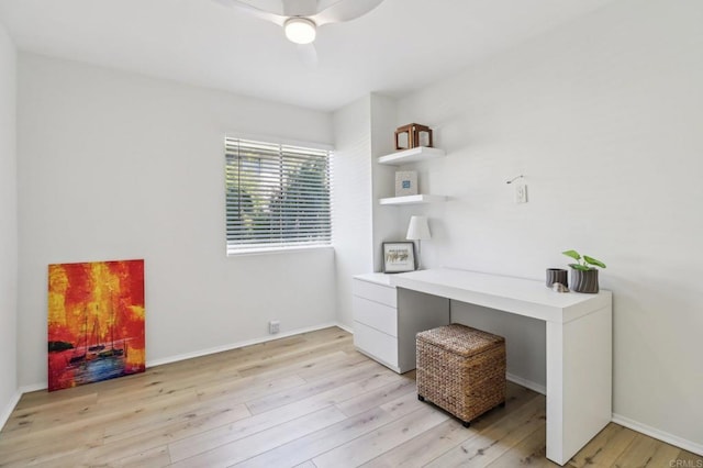 office space with ceiling fan and light wood-type flooring