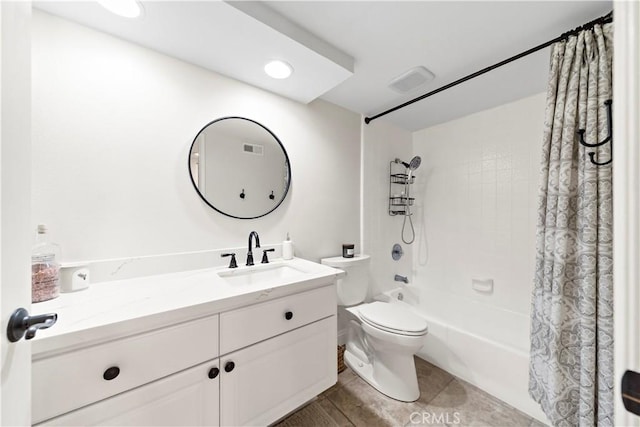 full bathroom with tile patterned flooring, vanity, shower / tub combo with curtain, and toilet