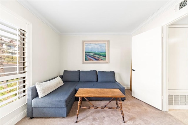 living room with ornamental molding and light carpet