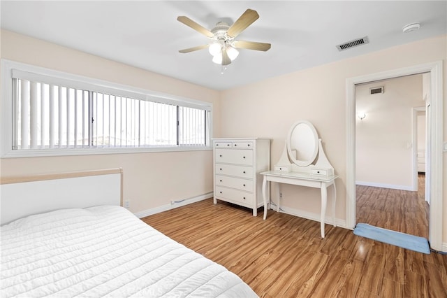 bedroom featuring ceiling fan and hardwood / wood-style floors