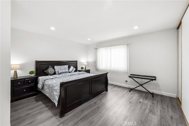 bedroom featuring light wood-type flooring