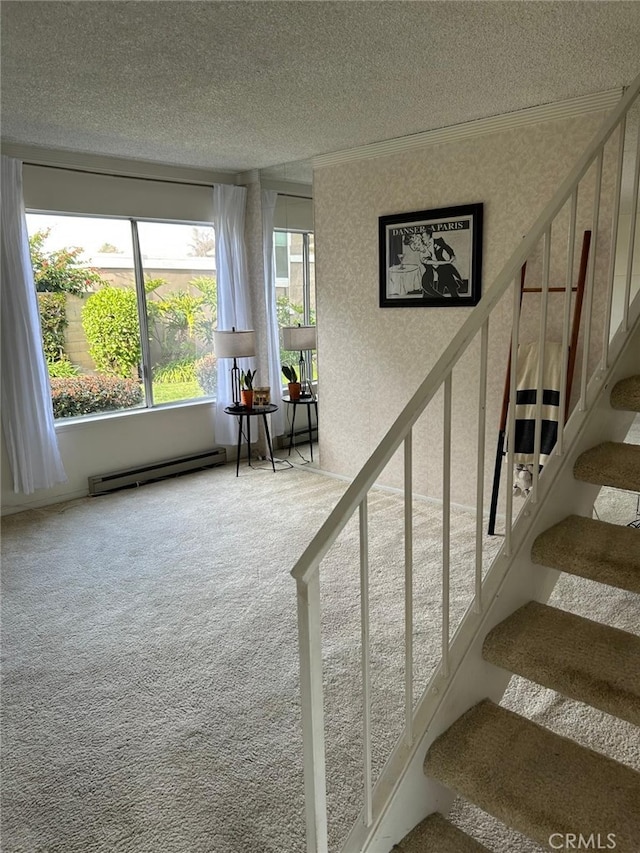 stairs featuring a baseboard radiator, carpet flooring, and a textured ceiling