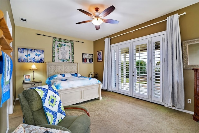 bedroom featuring light colored carpet, access to exterior, ceiling fan, and french doors