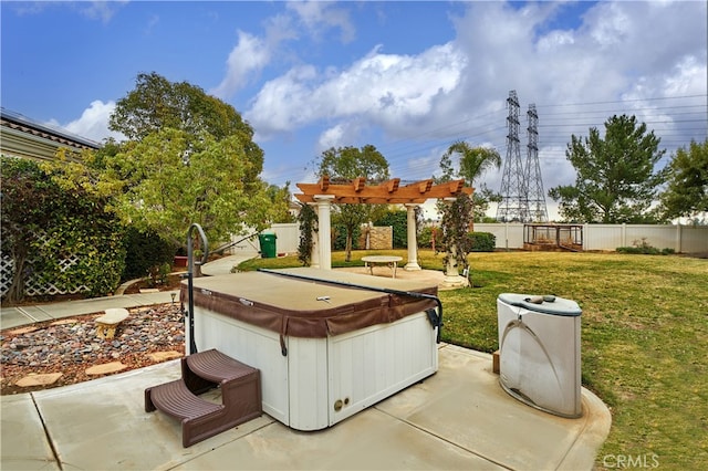 view of yard featuring a hot tub, a patio area, and a pergola