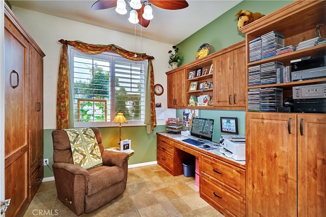 office area featuring built in desk and ceiling fan