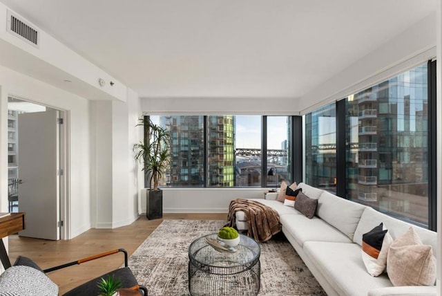 living room with light hardwood / wood-style floors