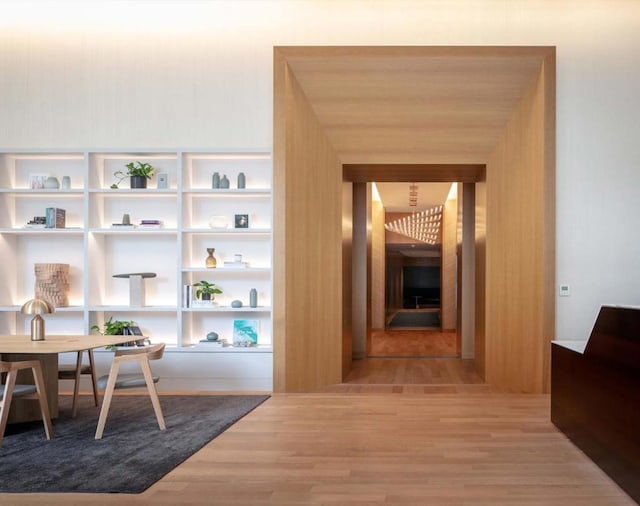 hallway featuring hardwood / wood-style flooring