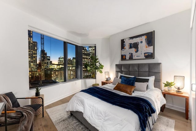 bedroom with wood-type flooring