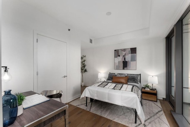 bedroom with light wood-type flooring