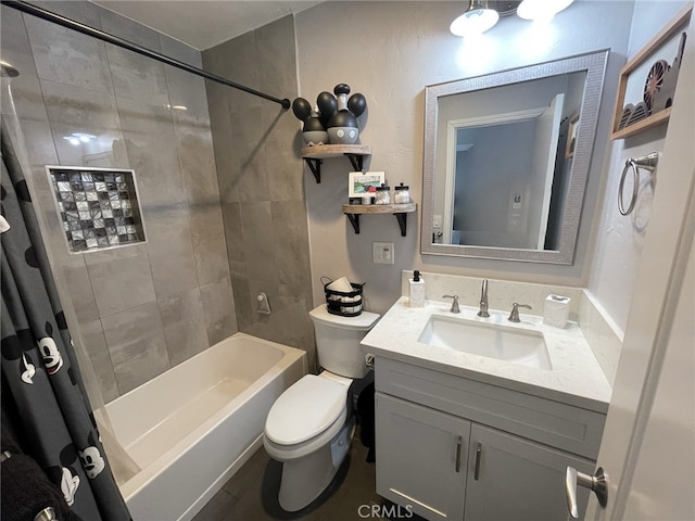 bathroom featuring toilet, shower / bath combo, and vanity