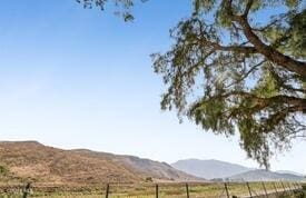 property view of mountains with a rural view