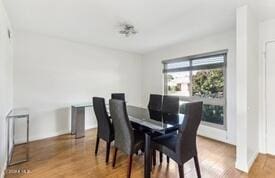 dining area featuring hardwood / wood-style floors