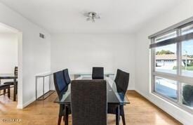 dining room with light wood-type flooring