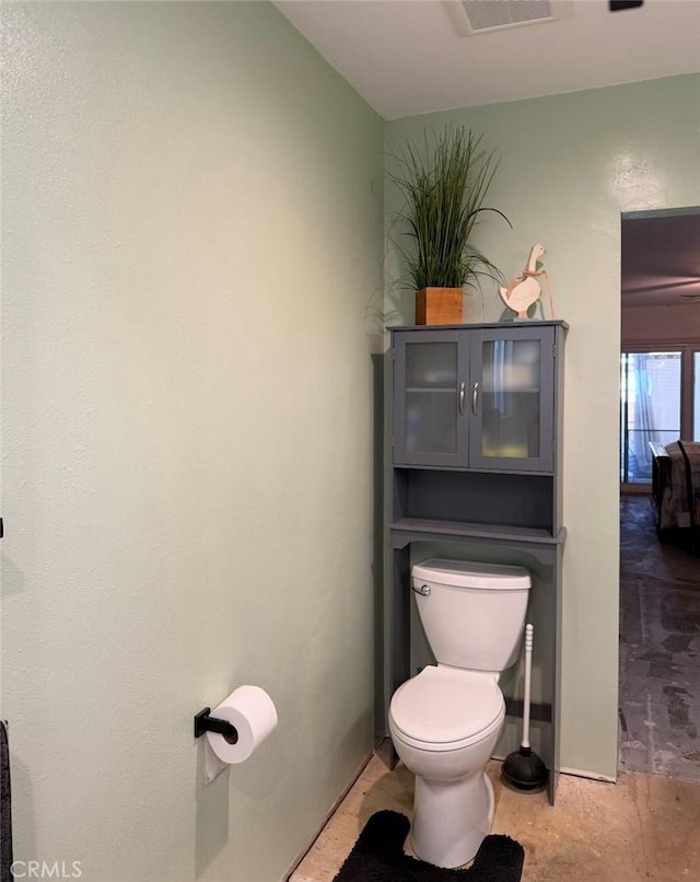 bathroom featuring toilet