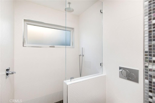 bathroom with walk in shower