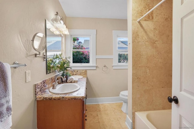 full bathroom featuring bathtub / shower combination, vanity, toilet, and tile patterned flooring