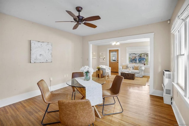 dining room featuring hardwood / wood-style flooring and ceiling fan