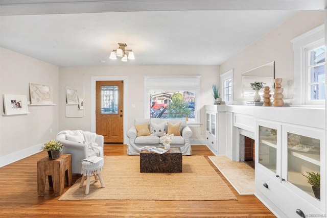 living room with light hardwood / wood-style floors