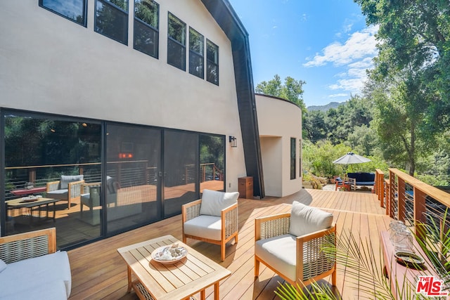 deck with an outdoor living space