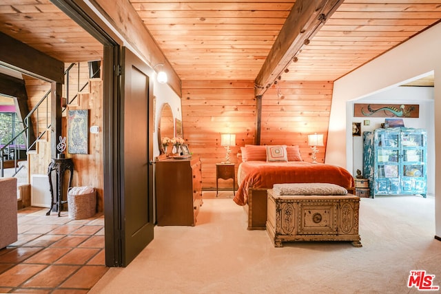 bedroom featuring wooden ceiling and wood walls