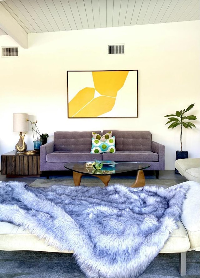 living room with wood ceiling and beamed ceiling