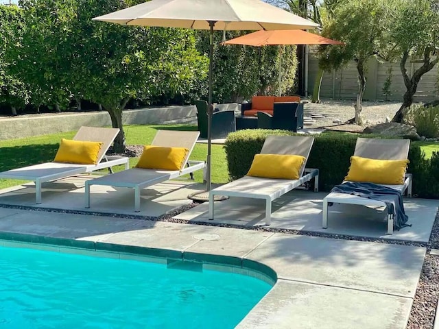 view of pool with an outdoor hangout area and a patio area