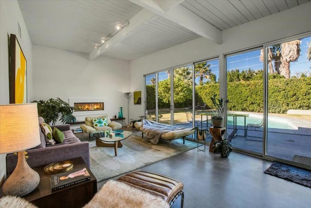 sunroom with beam ceiling