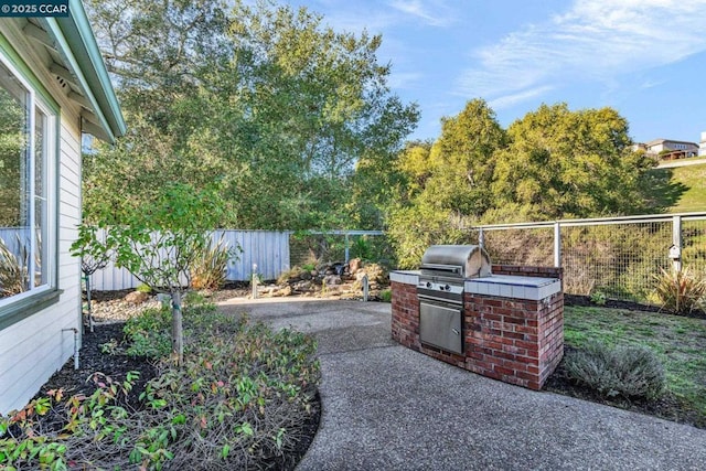 view of patio with area for grilling