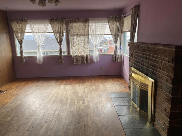 unfurnished living room featuring hardwood / wood-style floors