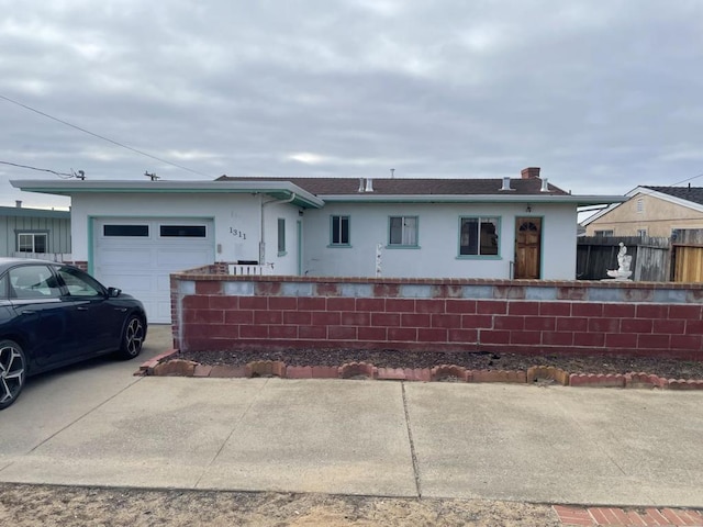 single story home featuring a garage