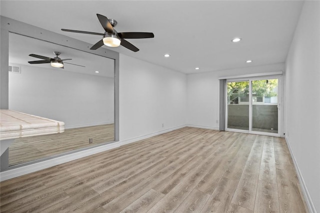 unfurnished living room with light wood-type flooring