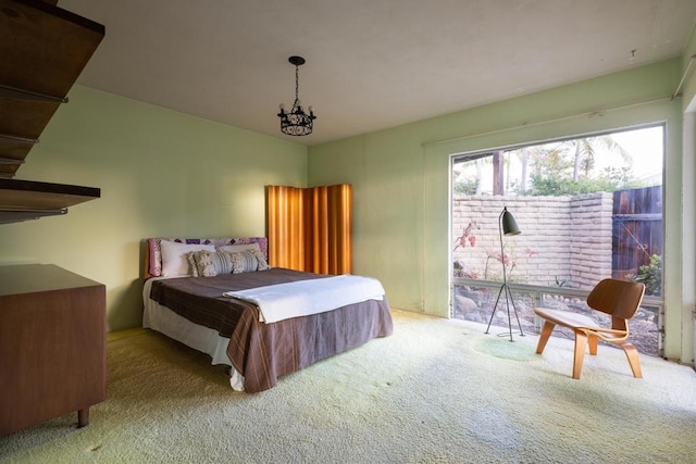 bedroom featuring light carpet