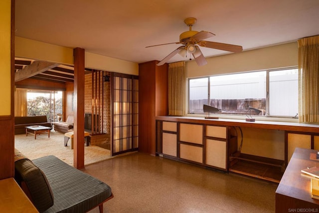 home office featuring ceiling fan and plenty of natural light