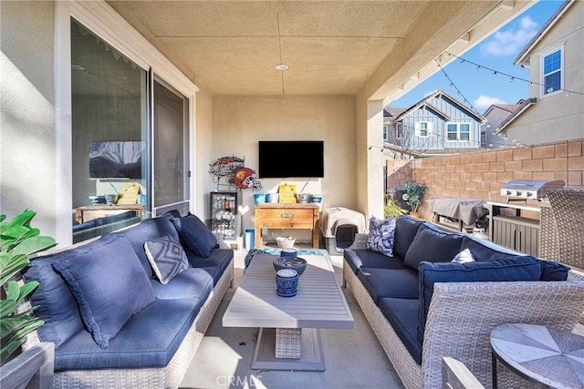 view of patio / terrace featuring a grill and outdoor lounge area