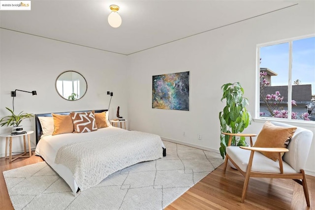 bedroom with light hardwood / wood-style flooring