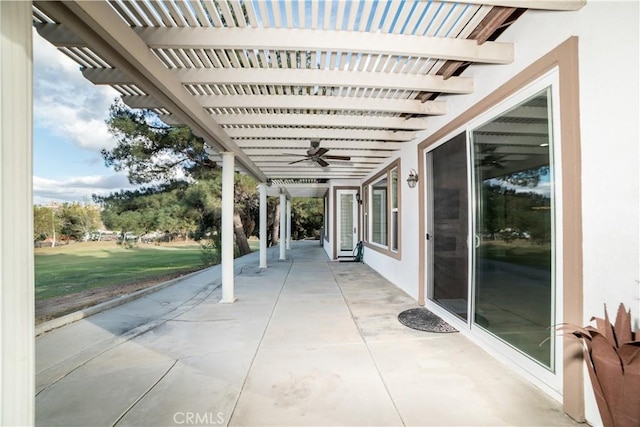 view of patio featuring a pergola and ceiling fan