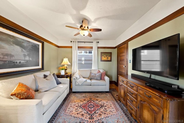 living room with ceiling fan