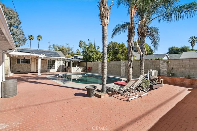 view of pool featuring a gazebo and a patio area