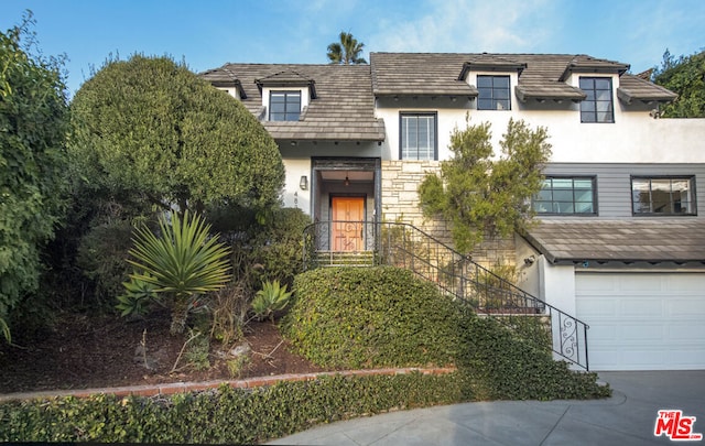 view of front of property with a garage