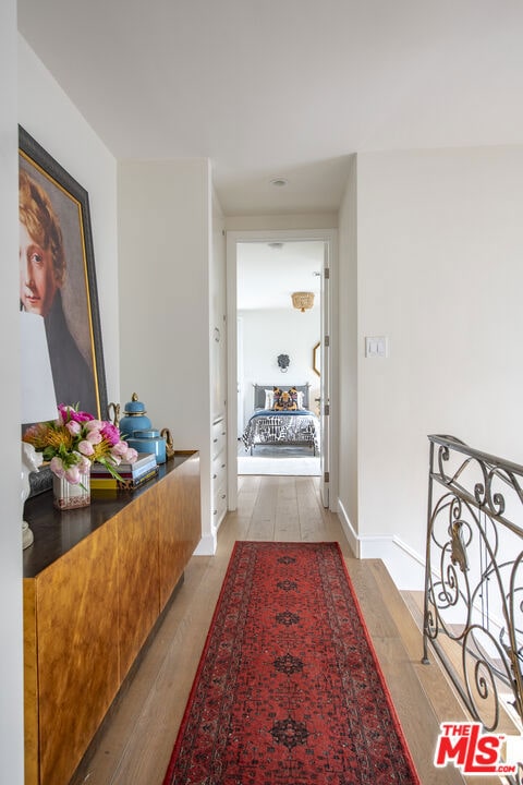 corridor featuring light wood-type flooring