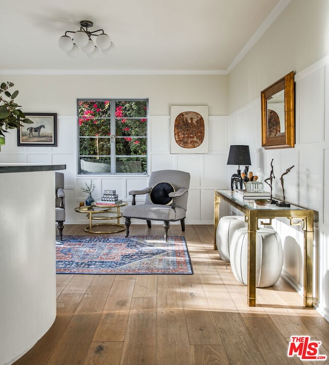 office space with ornamental molding and hardwood / wood-style floors