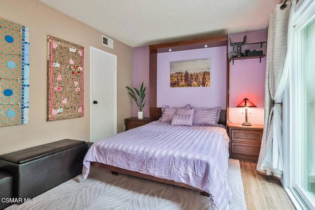 bedroom featuring light wood-type flooring