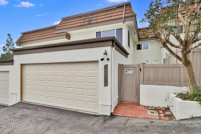 view of front of home featuring a garage