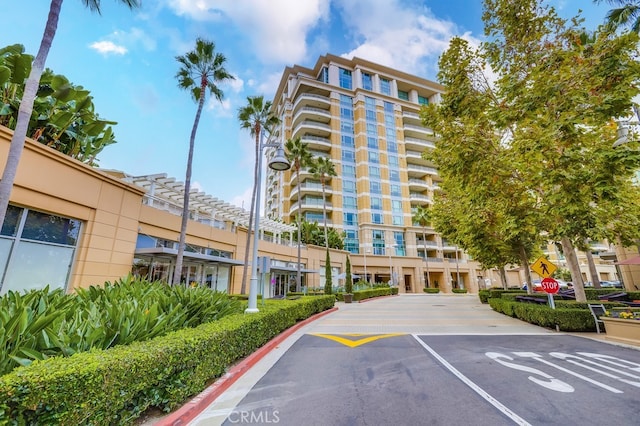 5042 Scholarship, Irvine, CA 92612 - view of apartment building / complex with uncovered parking