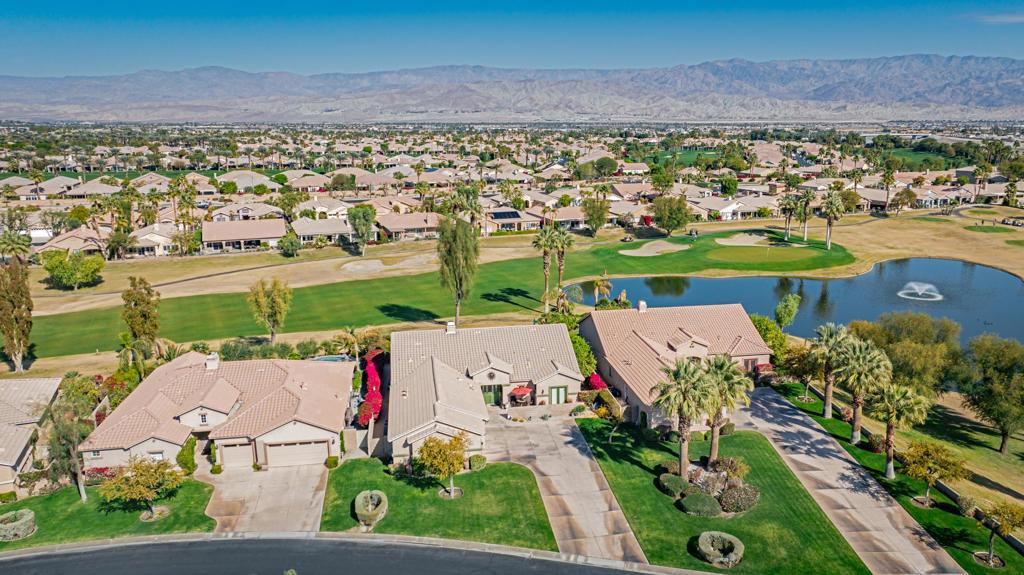 bird's eye view featuring a water and mountain view