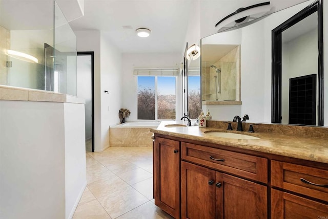 bathroom featuring vanity, independent shower and bath, and tile patterned flooring