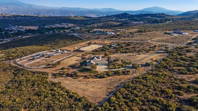 drone / aerial view featuring a mountain view