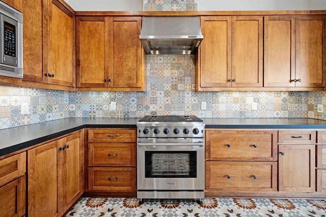 24916 Bareta Star Ranch Rd, Ramona, CA 92065 - kitchen with stainless steel appliances, wall chimney exhaust hood, brown cabinets, and backsplash